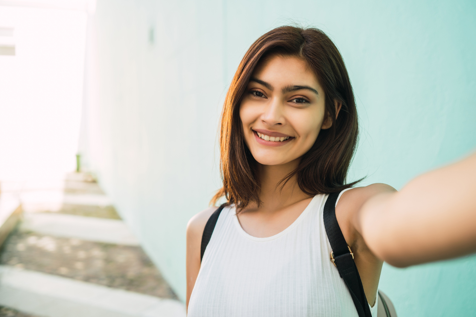 Young Latin Woman Taking a Selfie Outdoors