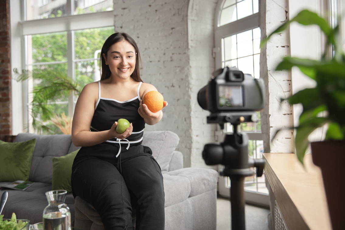 Young Woman Recording Her Healthy Lifestyle